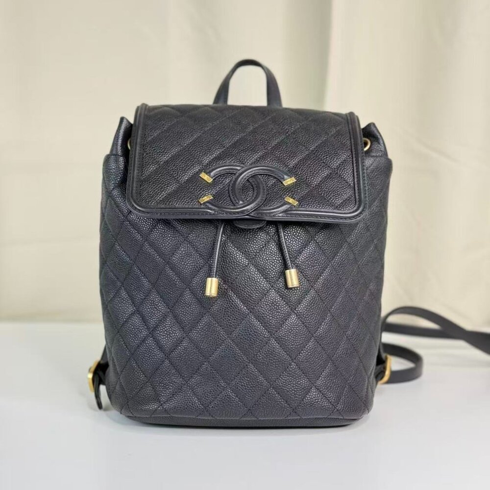 Chanel Black Caviar Filigree Backpack with Gold Accents & Quilted Design